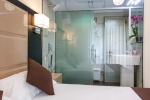 Кровать или кровати в номере Hotel Liro