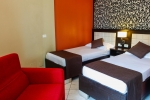 Кровать или кровати в номере Hotel Liro