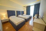 Кровать или кровати в номере Hotel Elesio