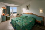Кровать или кровати в номере Sahara Beach Aquapark Resort