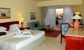 Кровать или кровати в номере Hilton Sharm Waterfalls Resort