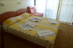 Кровать или кровати в номере Hotel Nimfa-Rusalka