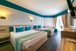 Кровать или кровати в номере Armas Regency