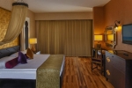 Кровать или кровати в номере Spice Hotel & Spa