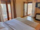 Кровать или кровати в номере Hotel Nais Beach