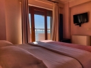 Кровать или кровати в номере Hotel Nais Beach