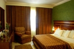Кровать или кровати в номере Delta Sharm Resort & Spa