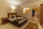 Кровать или кровати в номере Tivoli Hotel Aqua Park