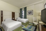 Кровать или кровати в номере Hilton Dubai The Walk