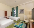Кровать или кровати в номере Hilton Dubai The Walk