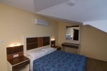 Кровать или кровати в номере Krizantem Hotel