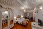 Кровать или кровати в номере Tuvana Hotel