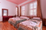 Кровать или кровати в номере Kaleiçi Marina Boutique Hotel - Restaurant