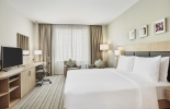 Кровать или кровати в номере Hilton Garden Inn Dubai Mall Of The Emirates