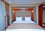 Кровать или кровати в номере Dosso Dossi Hotels Old City 