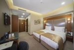 Кровать или кровати в номере Dosso Dossi Hotels Old City 