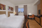 Кровать или кровати в номере DoubleTree by Hilton Hotel and Residences Dubai – Al Barsha 