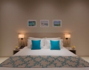 Кровать или кровати в номере Malahini Kuda Bandos Resort with 50% off on Transfer 
