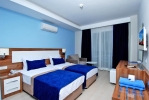 Кровать или кровати в номере Kleopatra Ramira Hotel - All Inclusive 