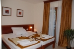 Кровать или кровати в номере Apartments Krapina 