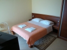 Кровать или кровати в номере Pima Apartmani 