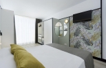 Кровать или кровати в номере Medplaya Hotel Calypso