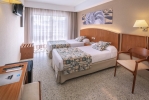 Кровать или кровати в номере GHT Oasis Park & Spa 