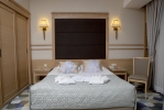 Кровать или кровати в номере Fame Residence Lara & Spa 
