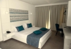 Кровать или кровати в номере Hotel El Fell 