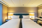 Кровать или кровати в номере Caresse a Luxury Collection Resort & Spa, Bodrum 