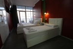 Кровать или кровати в номере Aparthotel Espana 