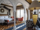 Кровать или кровати в номере Jumeirah Al Qasr