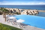 Вид на бассейн в The Cove Rotana Resort - Ras Al Khaimah или окрестностях