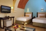 Кровать или кровати в номере The Cove Rotana Resort - Ras Al Khaimah