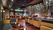Лаундж или бар в The Cove Rotana Resort - Ras Al Khaimah
