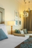Кровать или кровати в номере Ajman Saray, a Luxury Collection Resort