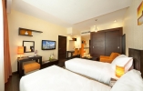 Кровать или кровати в номере Marina View Deluxe Hotel Apartment