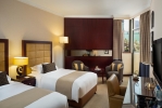 Кровать или кровати в номере Beach Rotana - Abu Dhabi