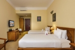 Кровать или кровати в номере Terracotta Resort & Spa