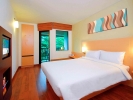 Кровать или кровати в номере Ibis Phuket Kata