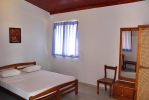 Кровать или кровати в номере Roy Villa Beach Hotel
