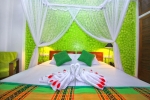 Кровать или кровати в номере Rockside Beach Resort
