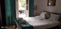 Кровать или кровати в номере Santiago Beach Resort