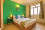 Кровать или кровати в номере Palmarinha Resort & Suites