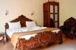 Кровать или кровати в номере Villa Theresa Beach Resort