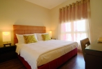Кровать или кровати в номере Mövenpick Resort & Residences Aqaba