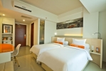 Кровать или кровати в номере HARRIS Hotel Seminyak