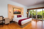 Кровать или кровати в номере Puri Saron Hotel Seminyak