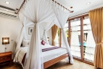 Кровать или кровати в номере Desamuda Village 