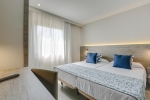 Кровать или кровати в номере Alua Palmanova Bay